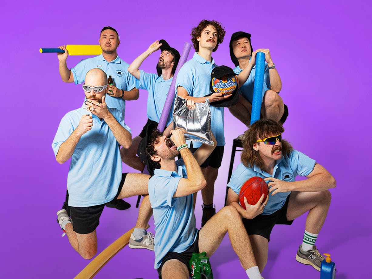 Playlunch band members doing stereotypical Australian  activiities