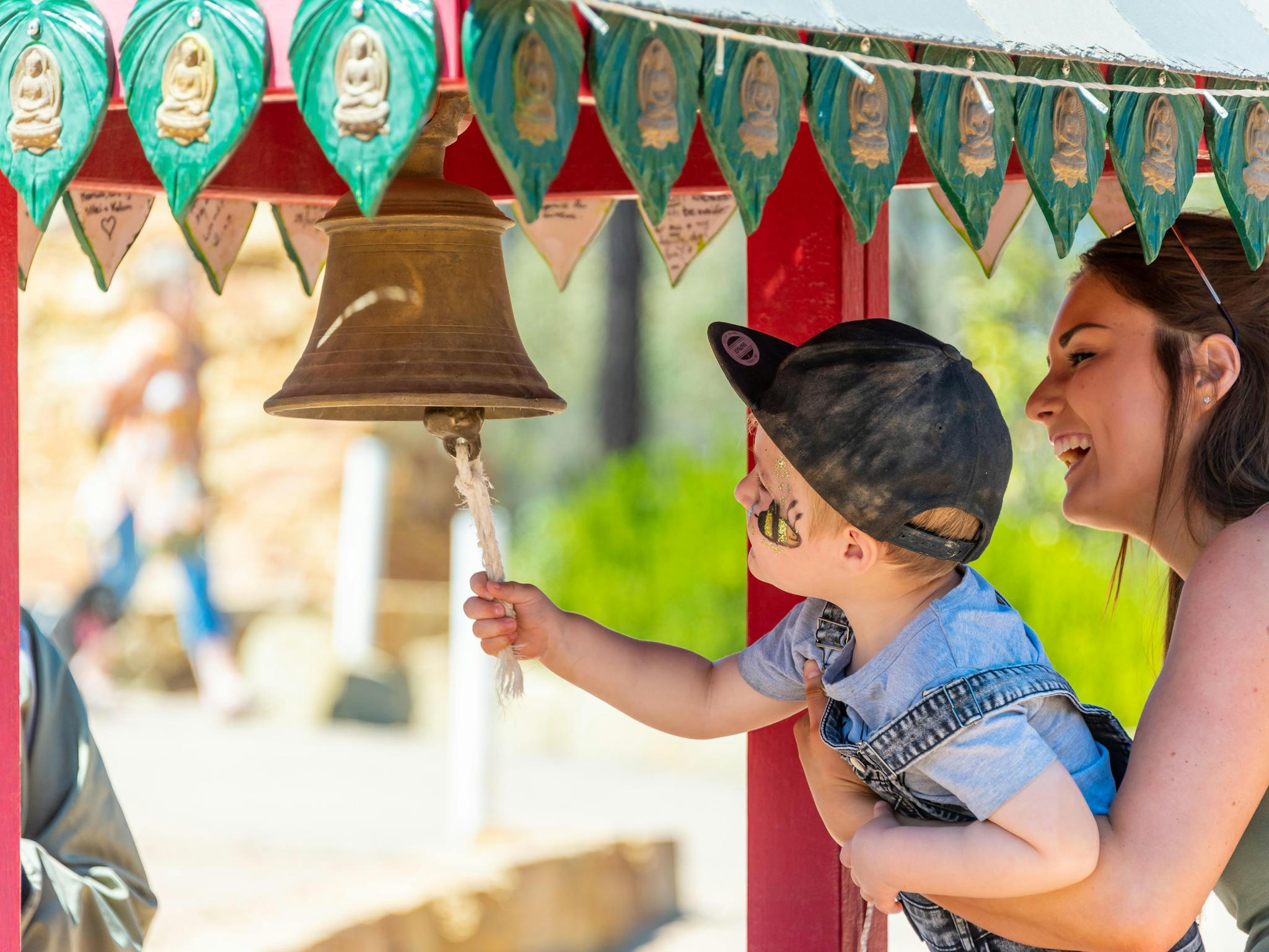 Mother and child at wishing well