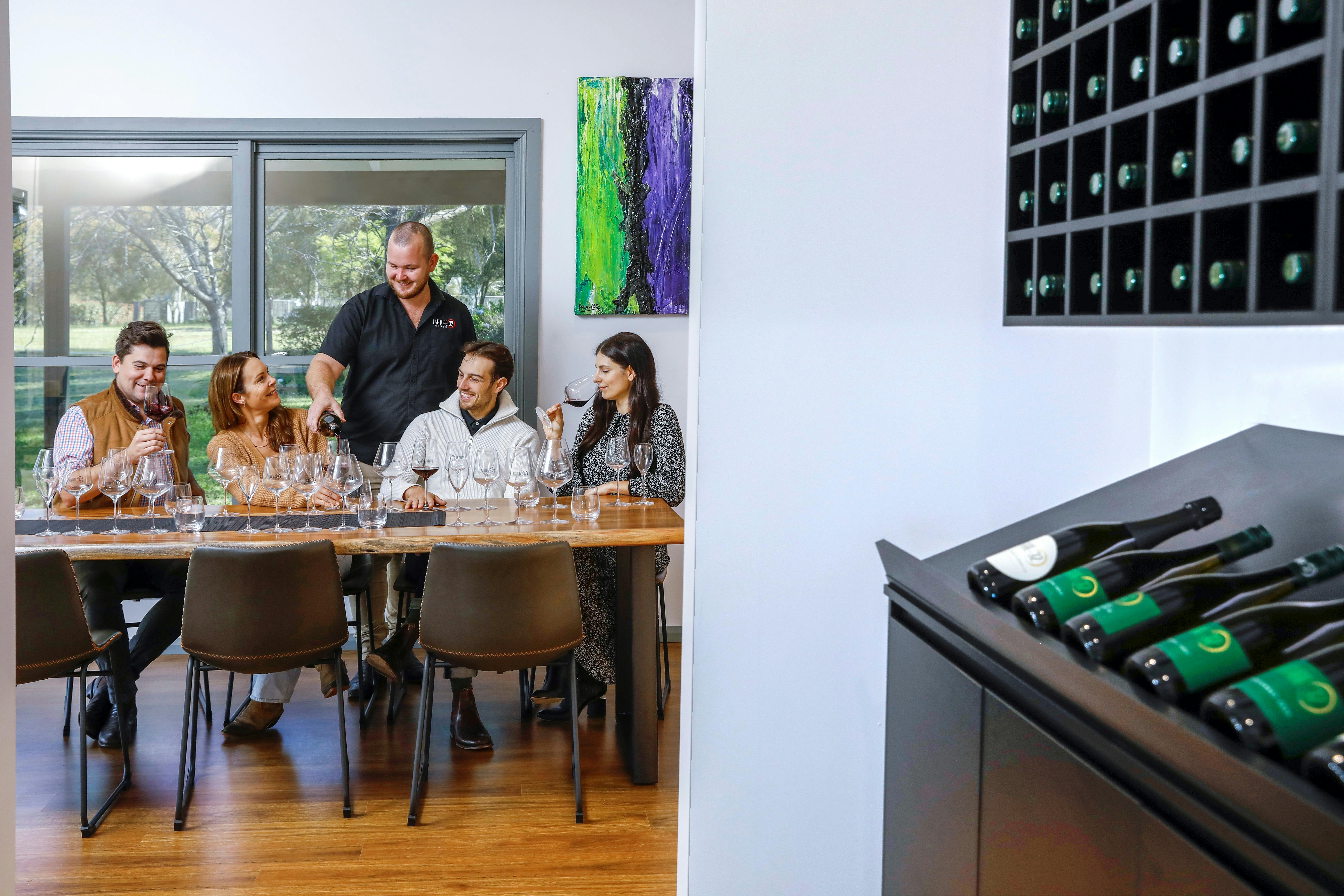 Group of people tasting wine