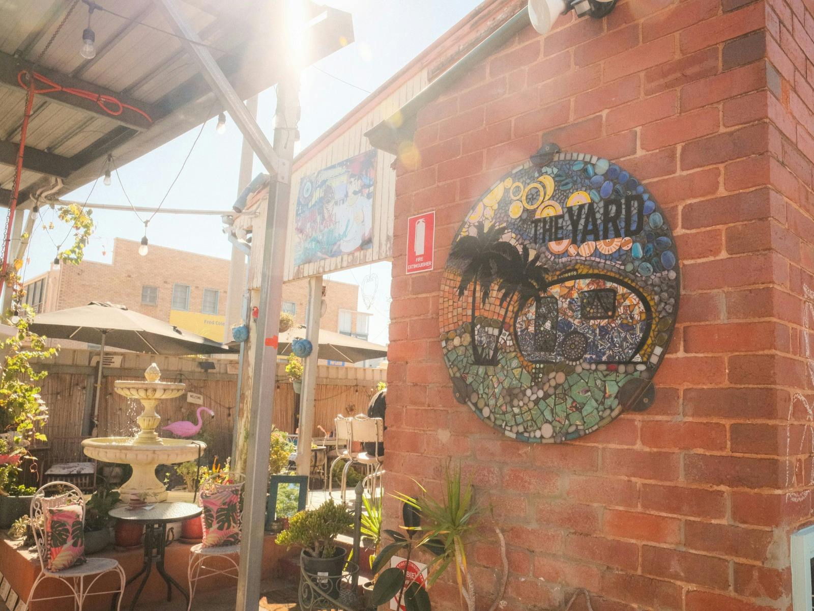 The Yard - mosaic sign