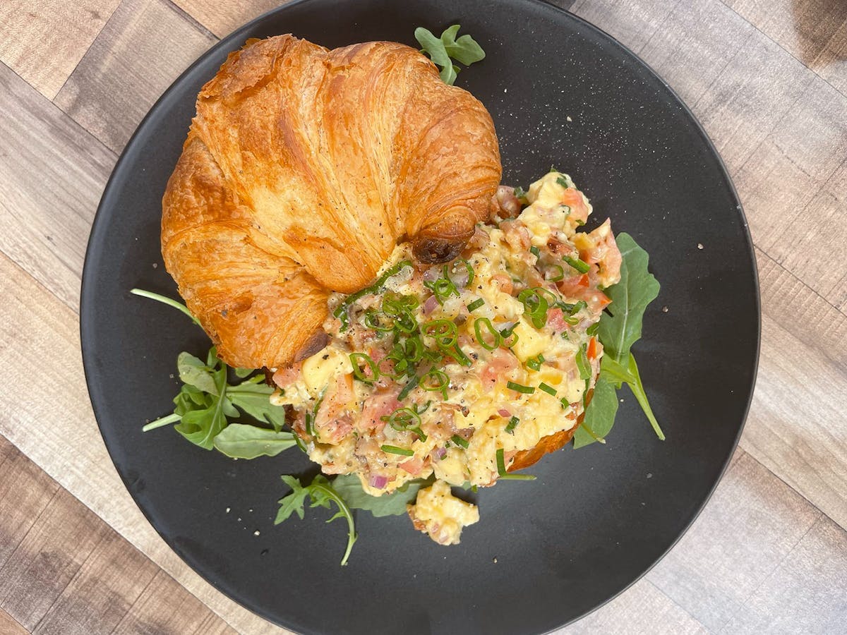 Scrambled eggs in a croissant.