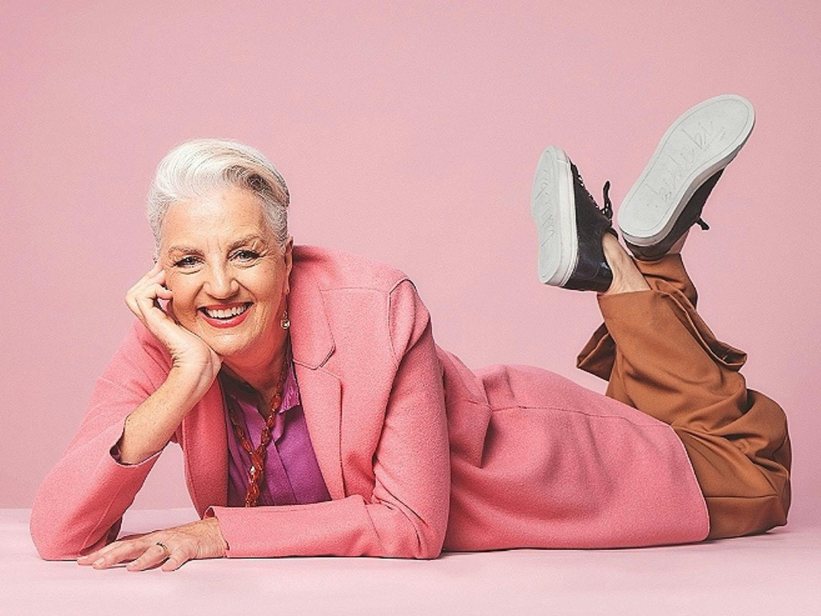 Lady (Jean Kitson) laying on the floor