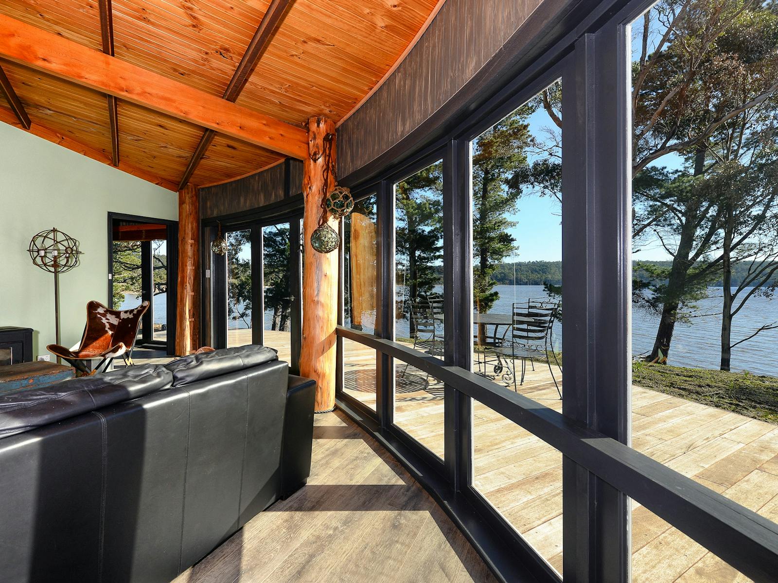 Taylors Bay Cottage:  lounge area and view over Taylors Bay.