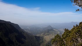 View of valley, mountains and farmland.