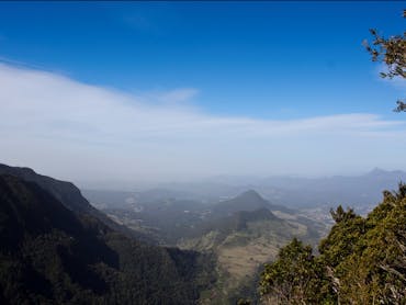 View of valley, mountains and farmland.