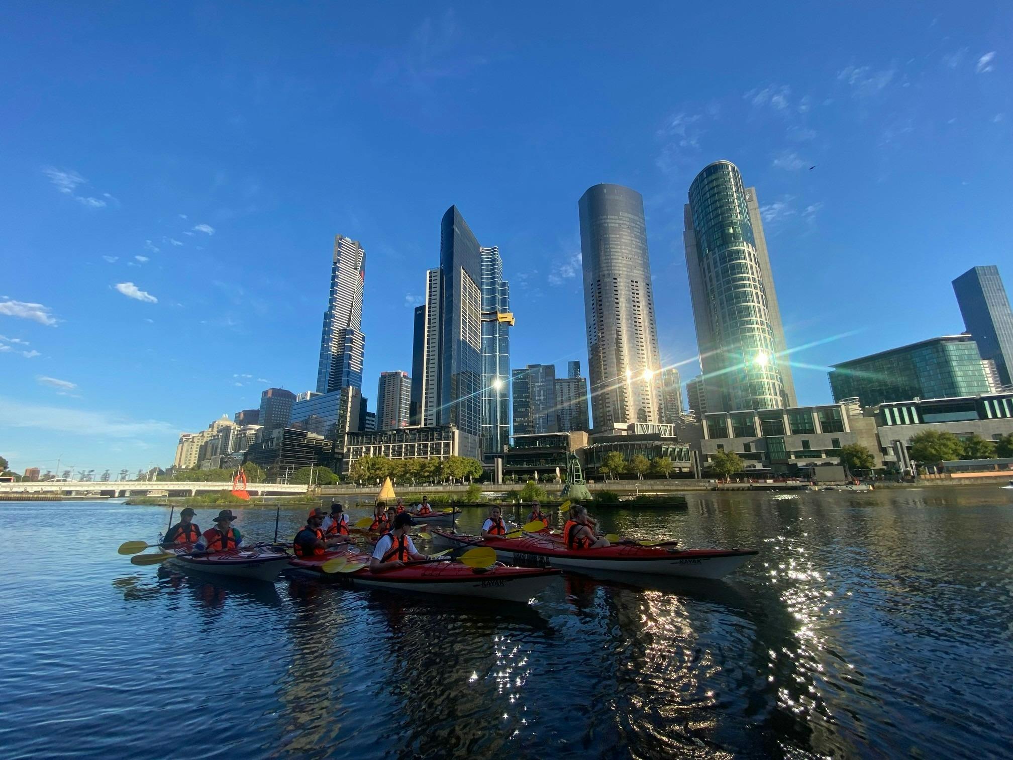 Kayak Group taking a break on the Yarra River near SeaLife.
