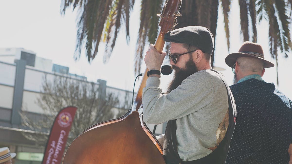 Man playing Bass in Slips and FWs