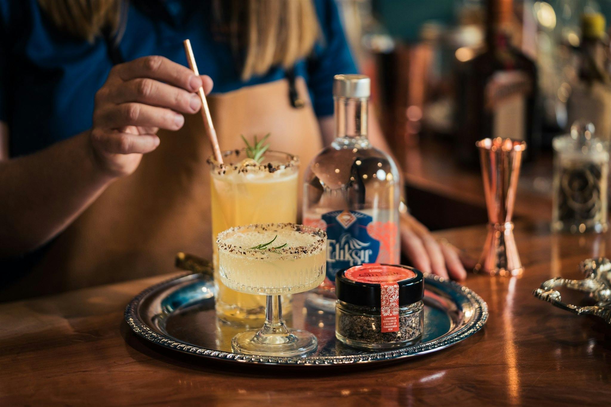 cocktails and gin on tray