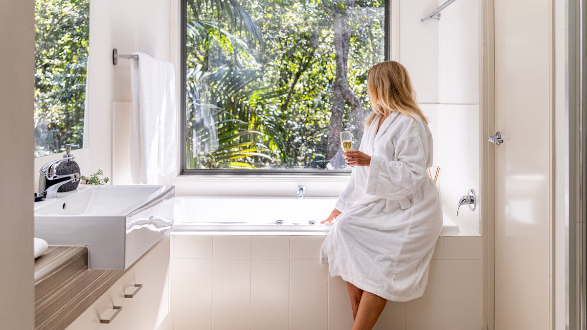 Guest enjoying the view from the bathroom