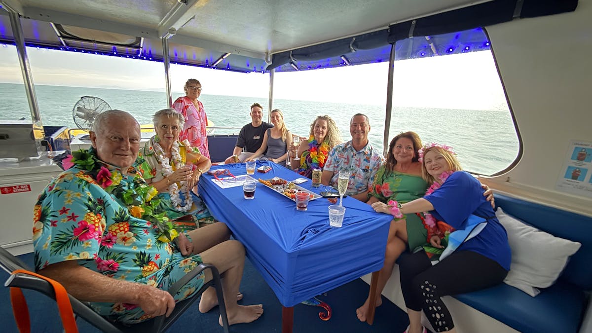 group of guests enjoying the top deck
