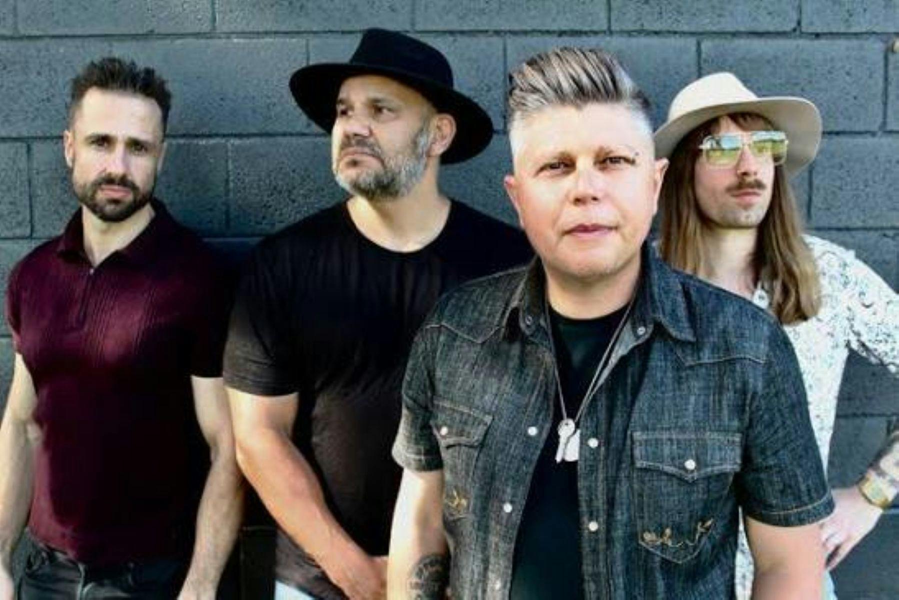 Australian country rock band Viper Creek poses together in a promotional photo, showcasing the group