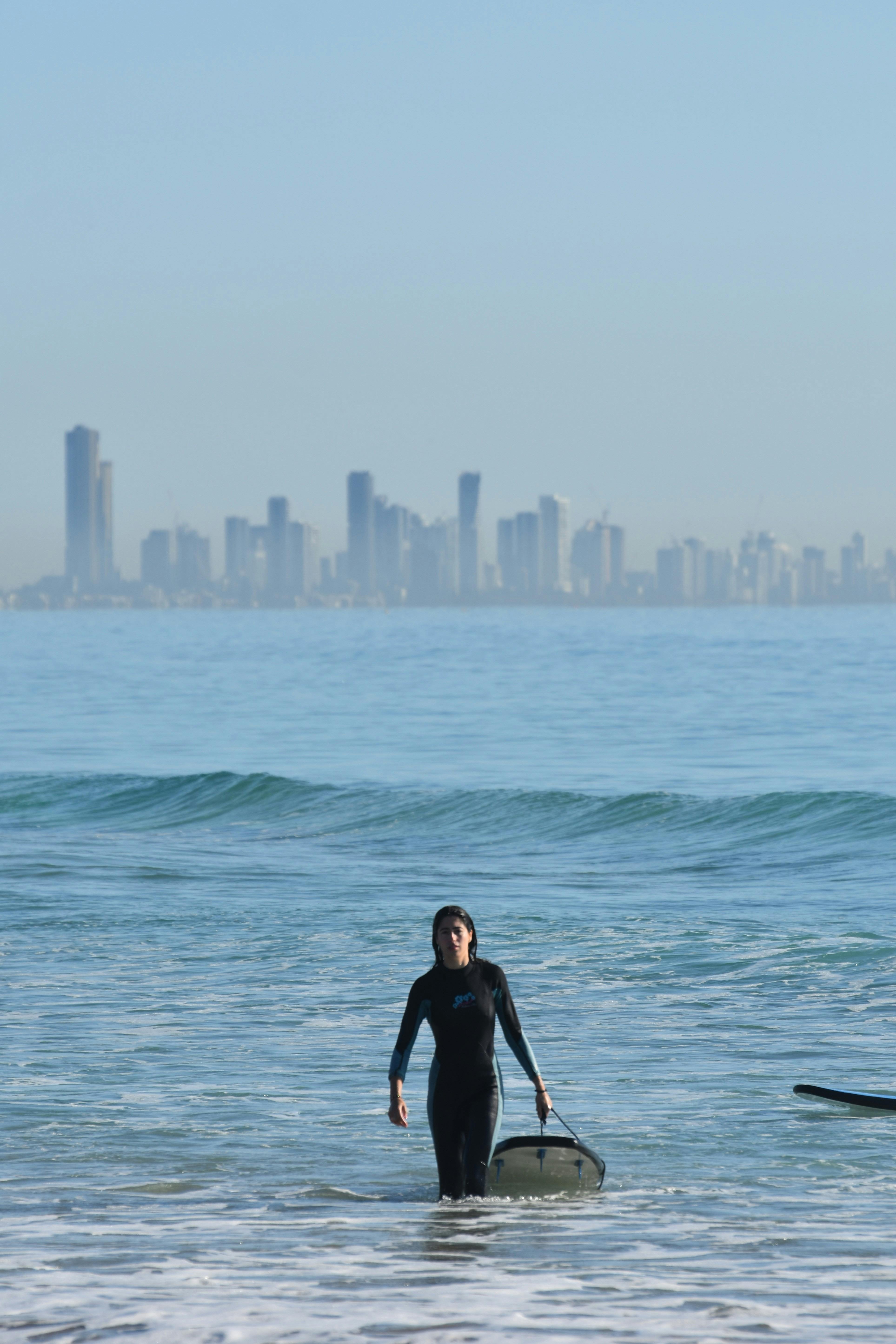 Learn to surf against the iconic Gold Coast skyline with Australian Surfing Adventures.