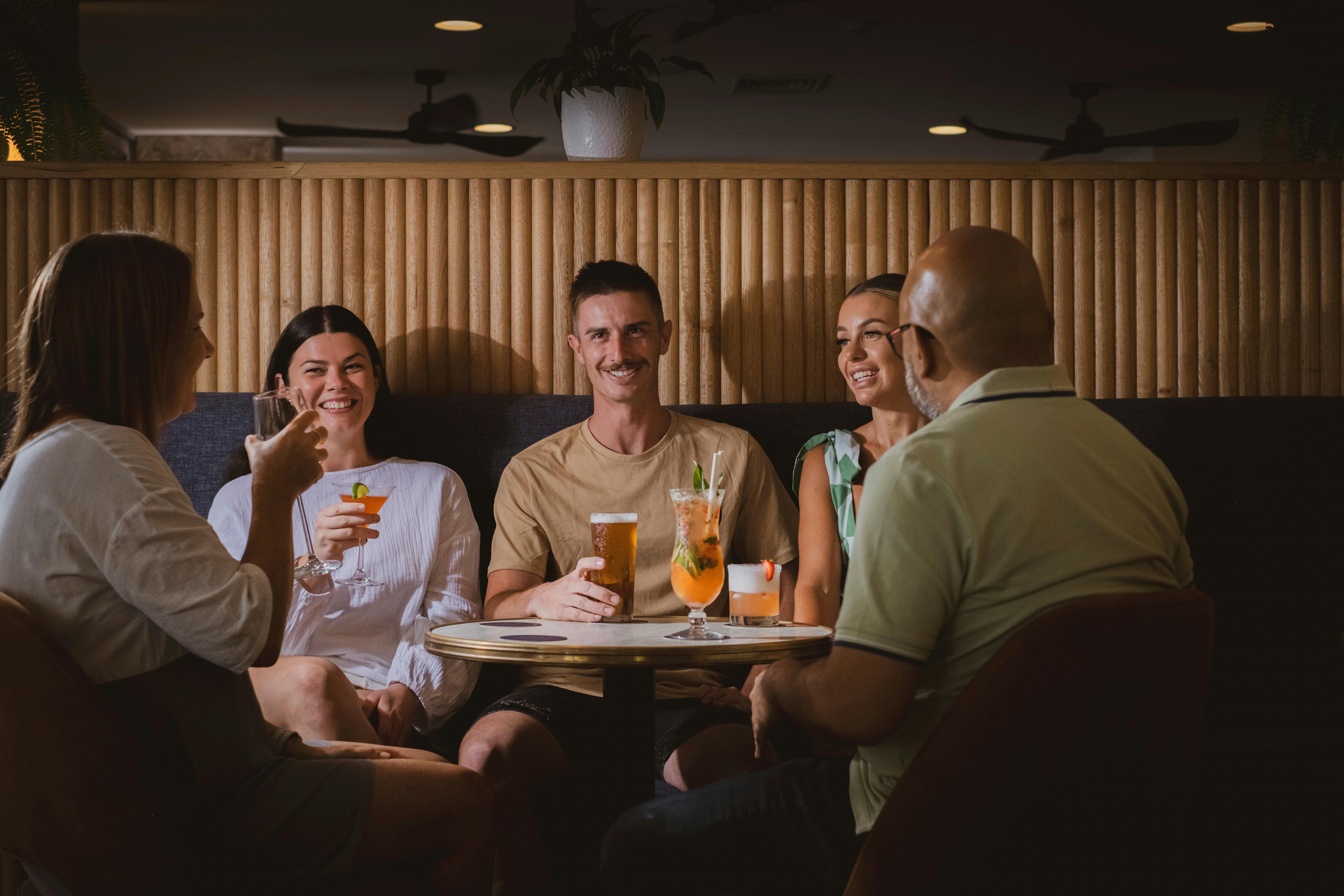 Group of people enjoying drinks at Birdrock Bar & Grill