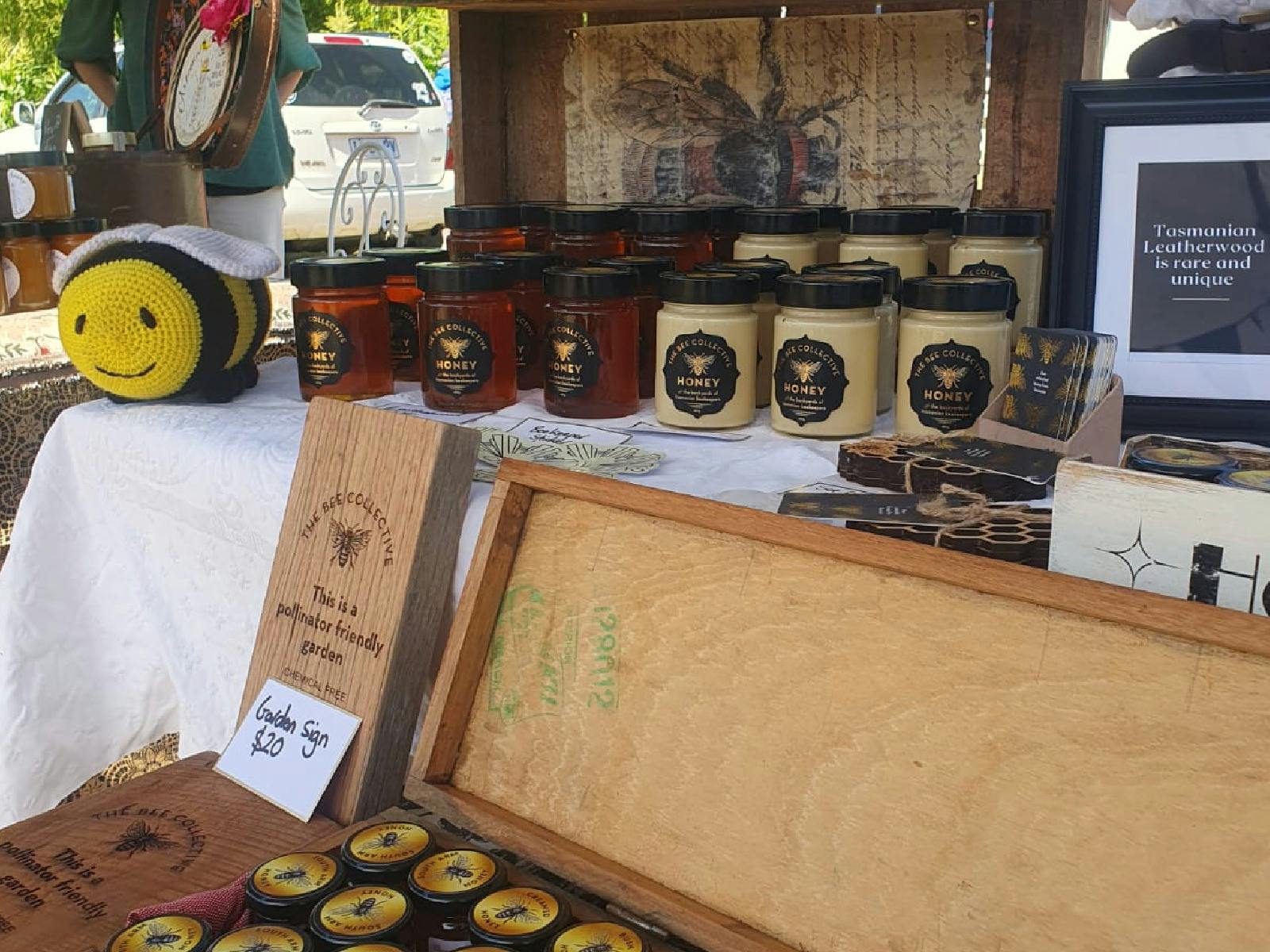 A local leatherwood honey company selling their jars on a stall.