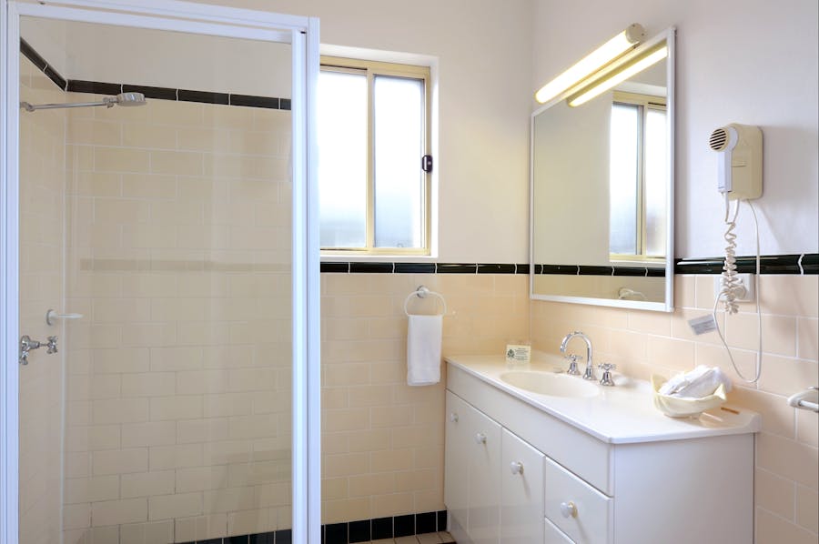 One bedroom apartment bathroom with shower