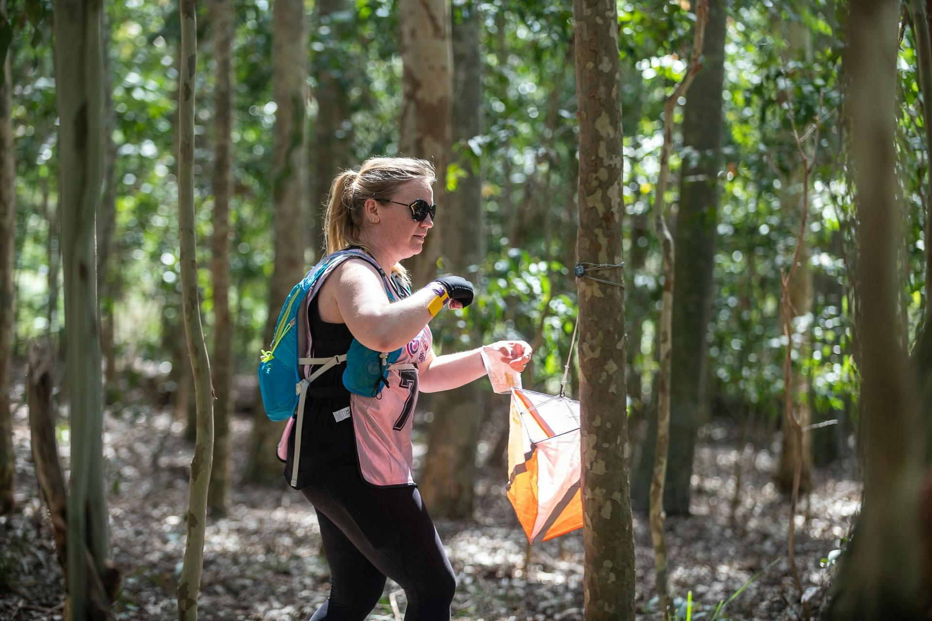 a participant 'registering' at the checkpoint at the Women Only Adventure Race