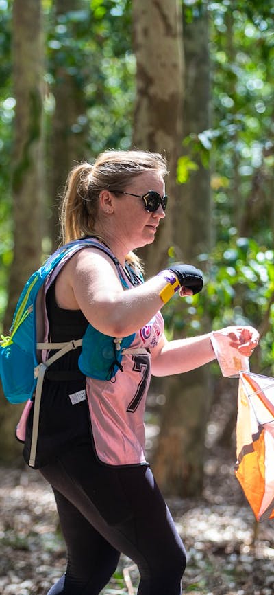 a participant 'registering' at the checkpoint at the Women Only Adventure Race