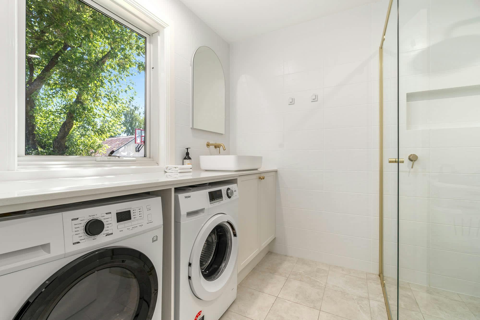 Laundry with washing machine, dryer