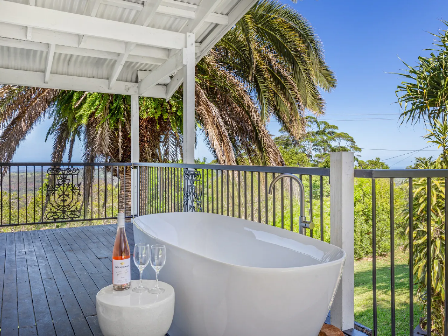 Balcony with free standing bath overlooking the view