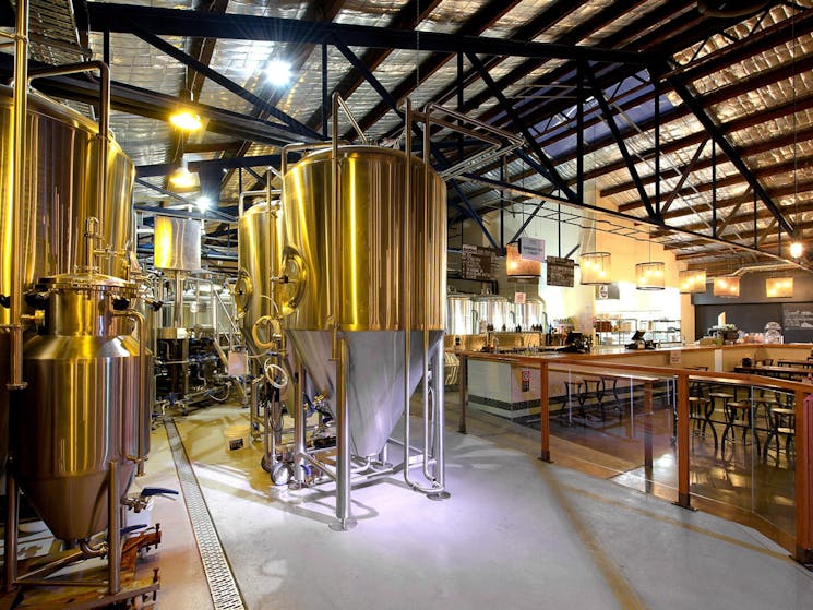 Interior of FogHorn Brewhouse with fermentation tanks in brewery area