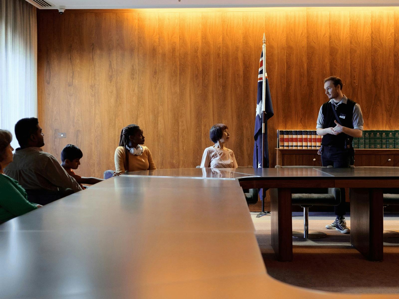 A group of people seated at the Cabinet Room