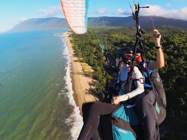 tandem paragliding along the coast