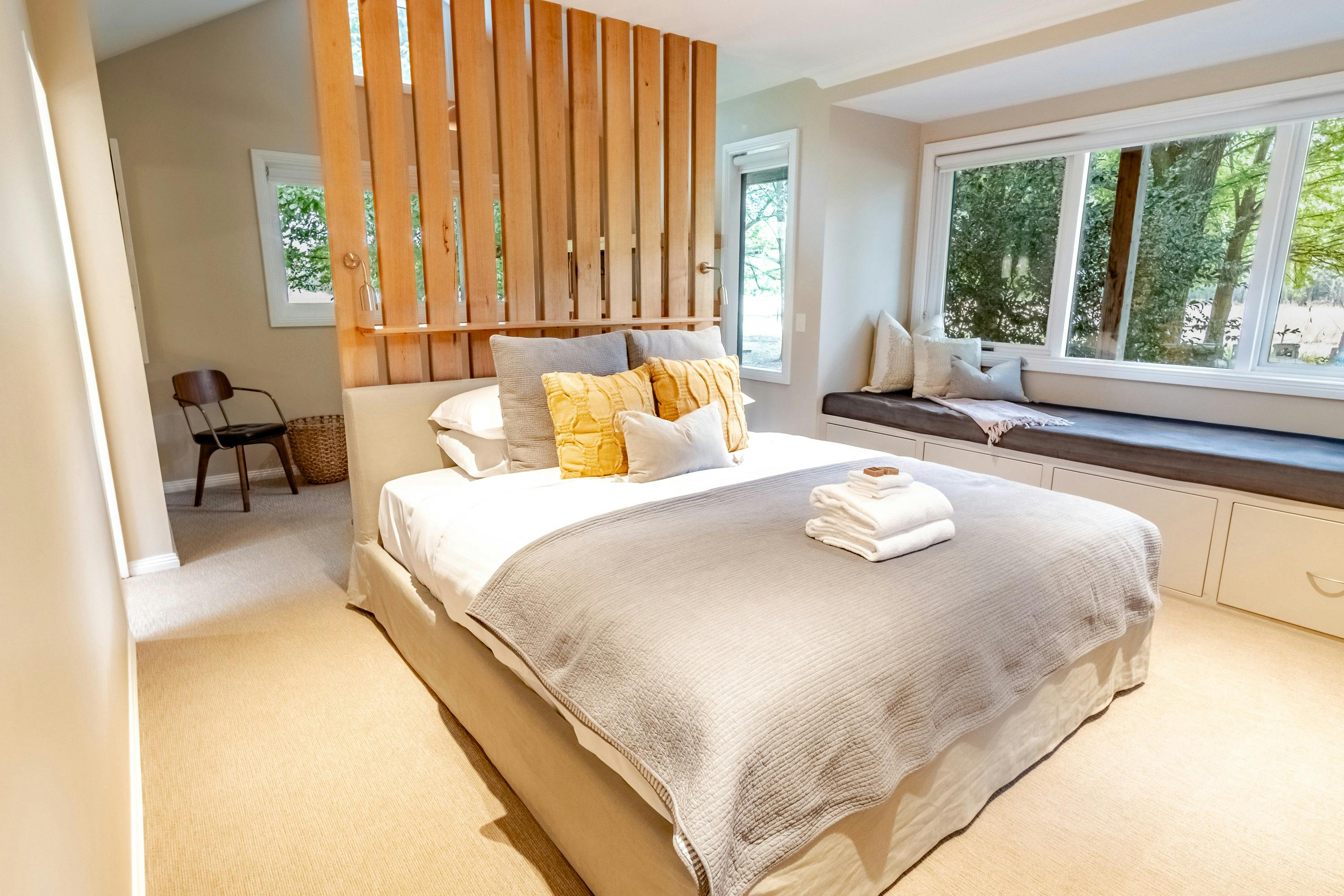 Master bedroom with wardrobes, garden views and ensuite