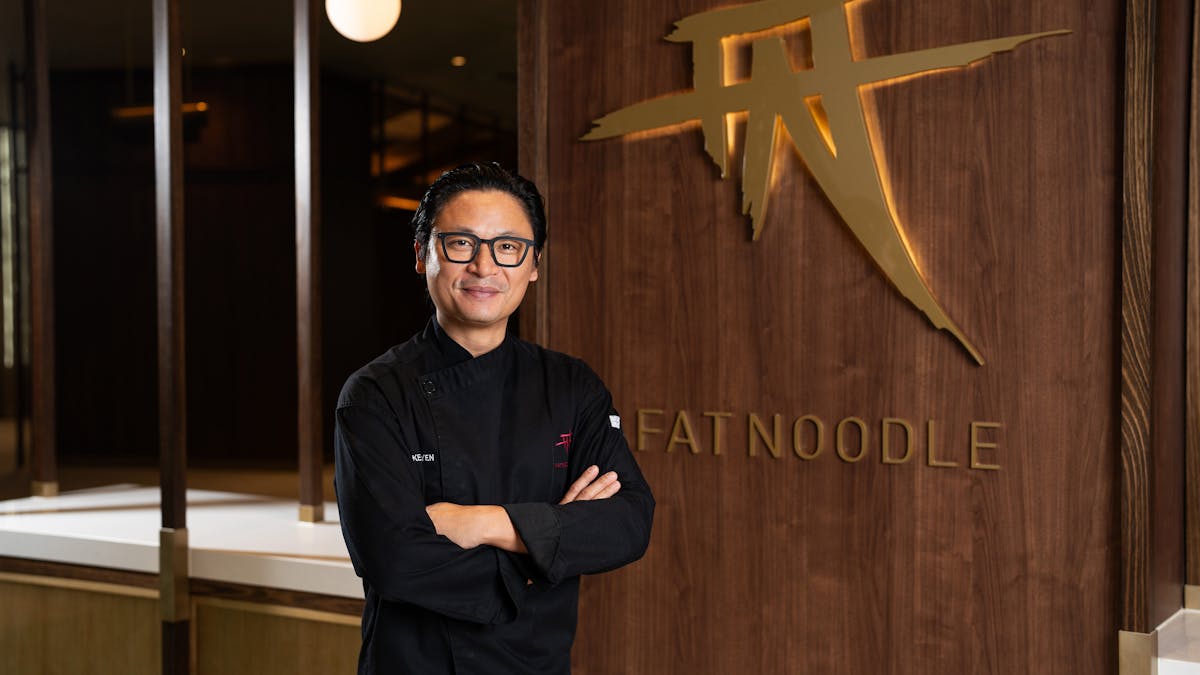 Fat Noodle Executive Chef Luke Nguyen, arms folded in front of new Fat Noodle at The Star Brisbane