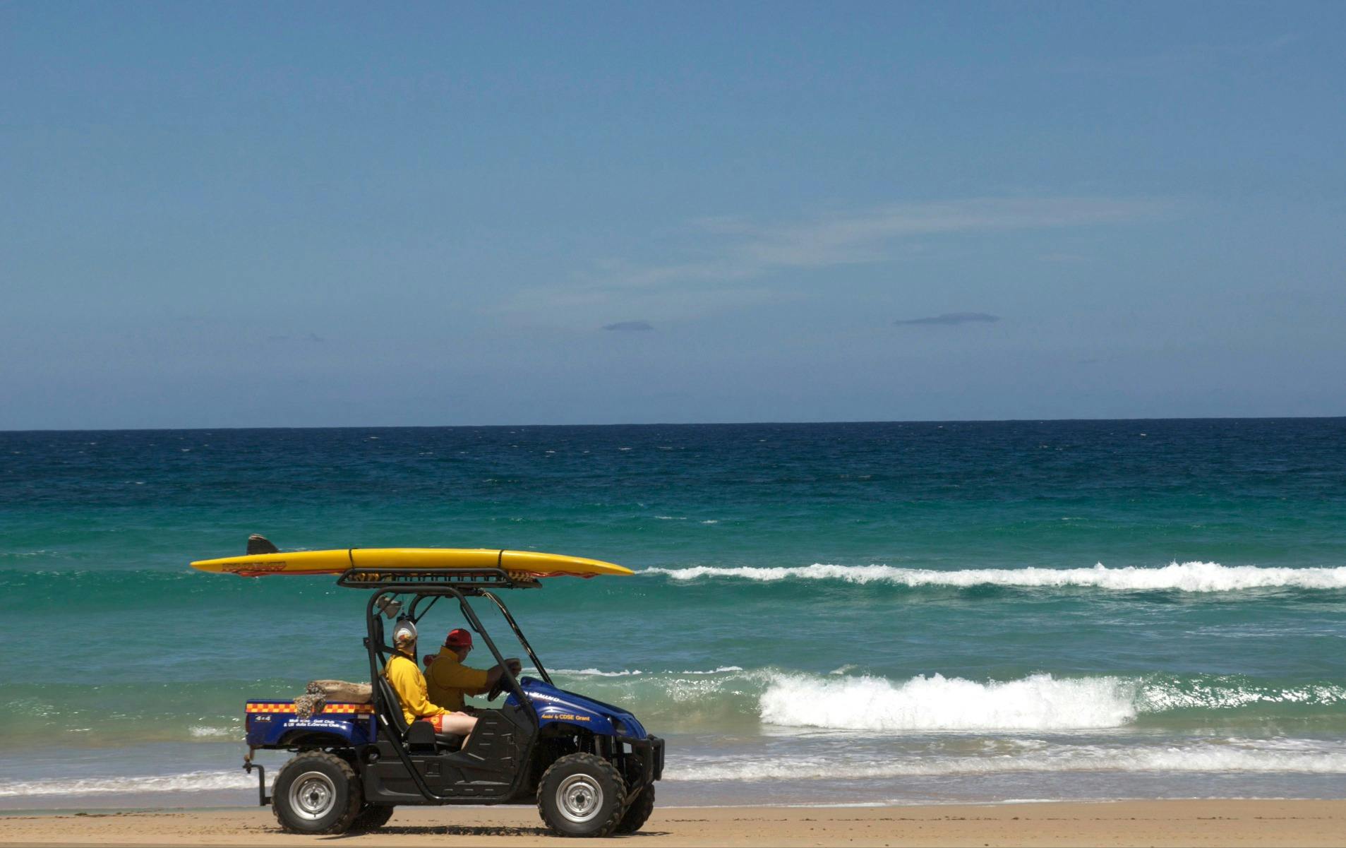 lifeguards in buggy on mollymook beach