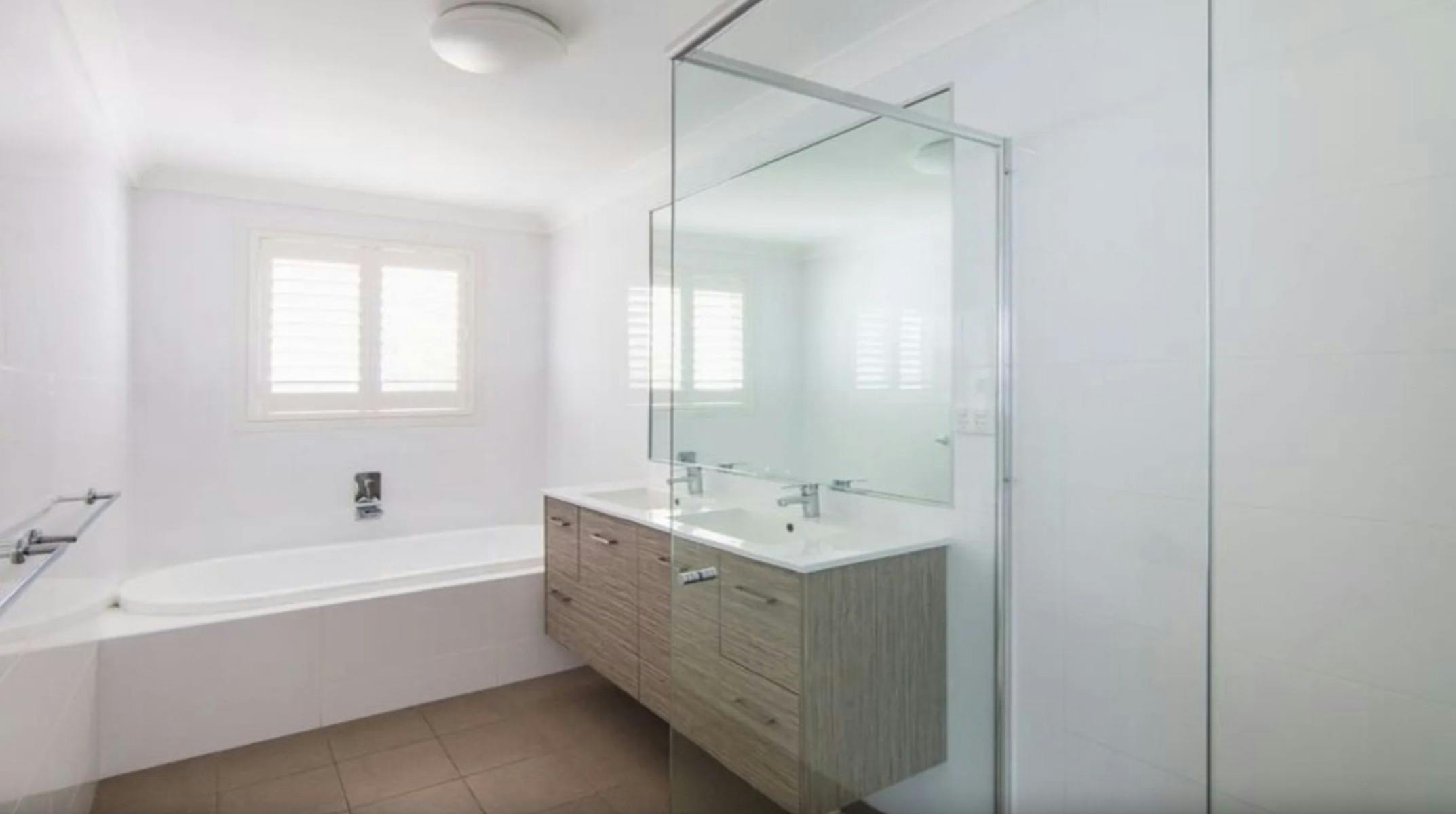 Bathroom with separate bath and shower