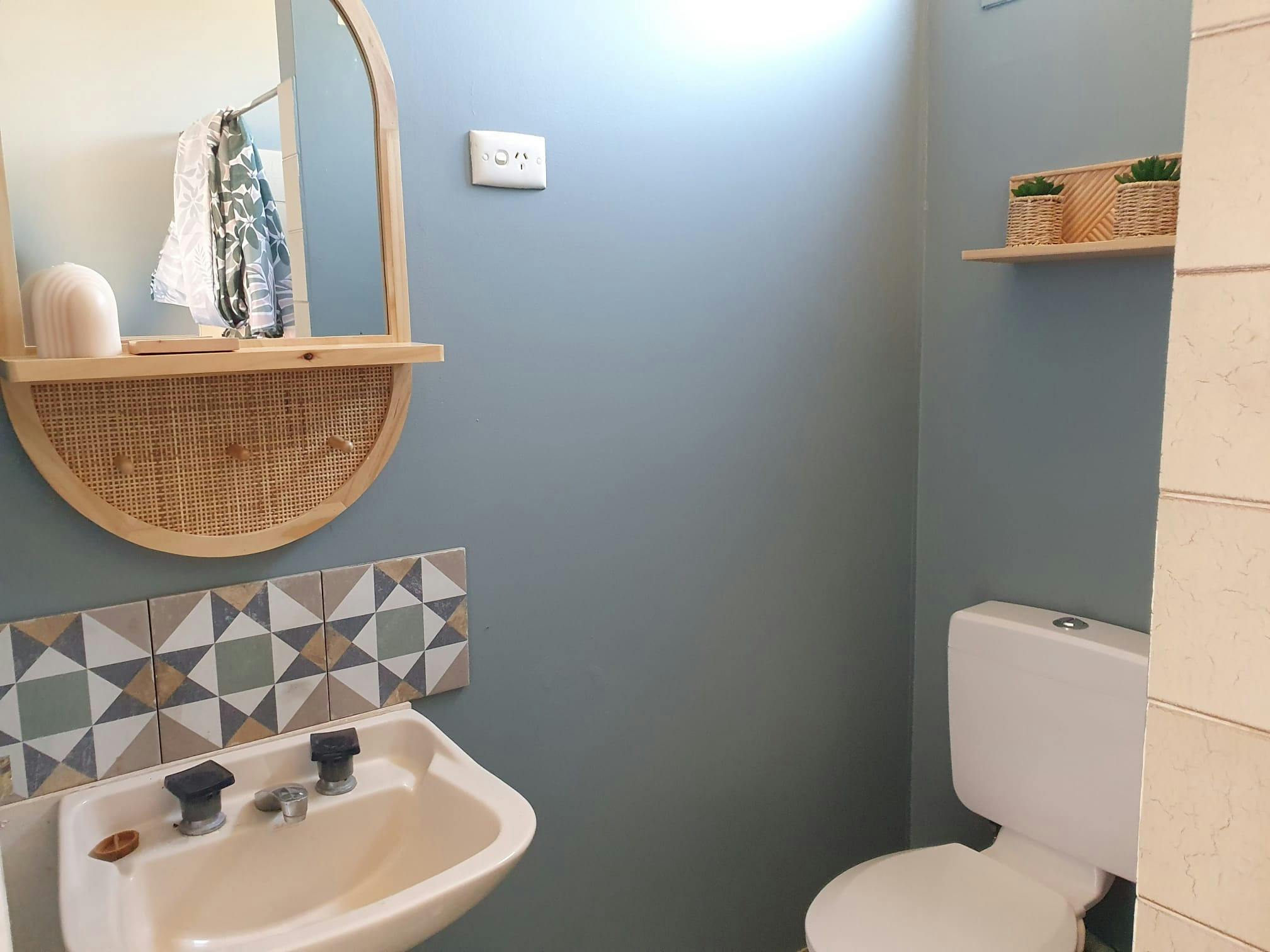Basin and toilet inside the Merino Cabin bathroom, Charlotte Plains, Outback Queensland