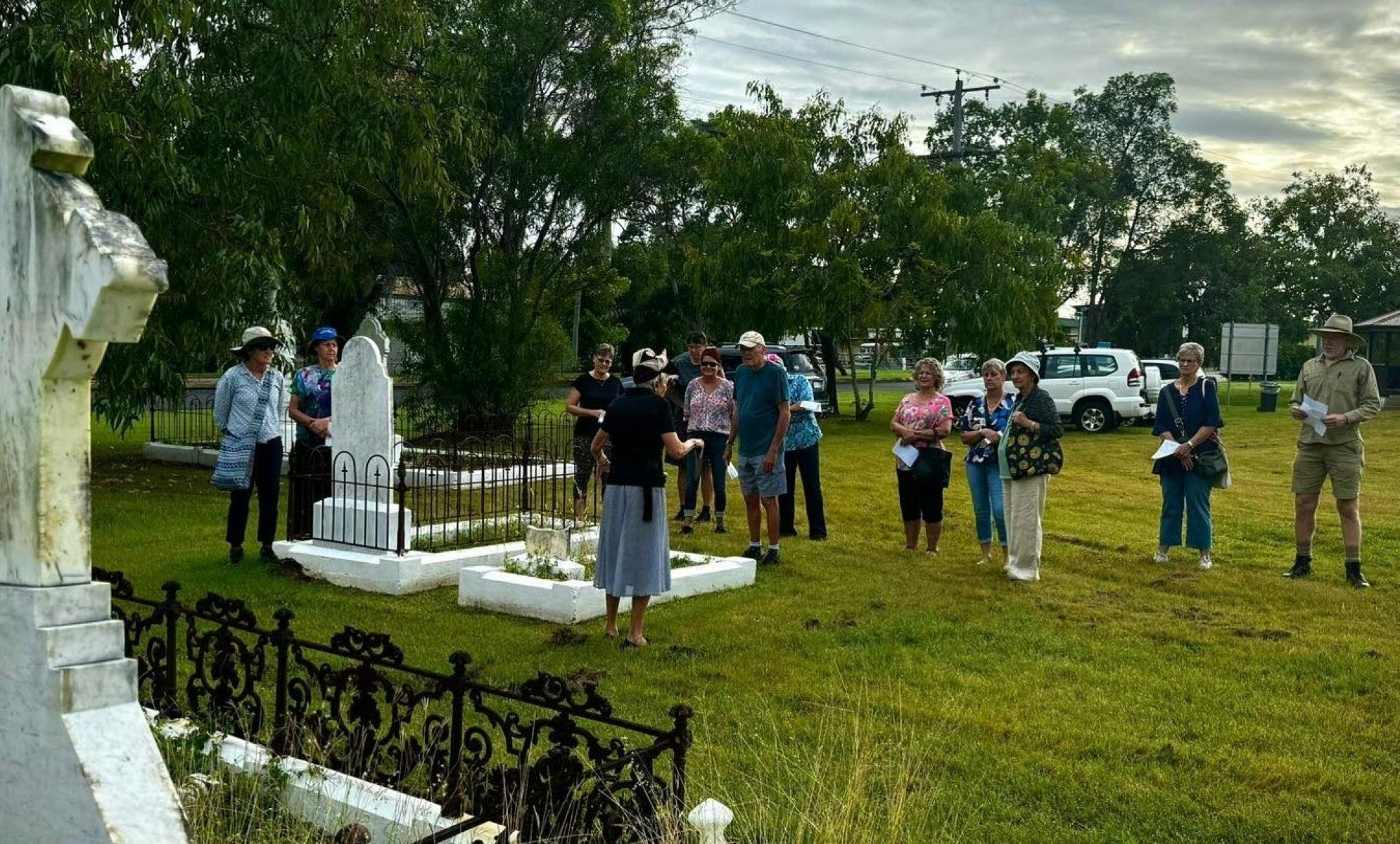 Baz and Mary talking with a group at the Pioneer Cemetery Tour