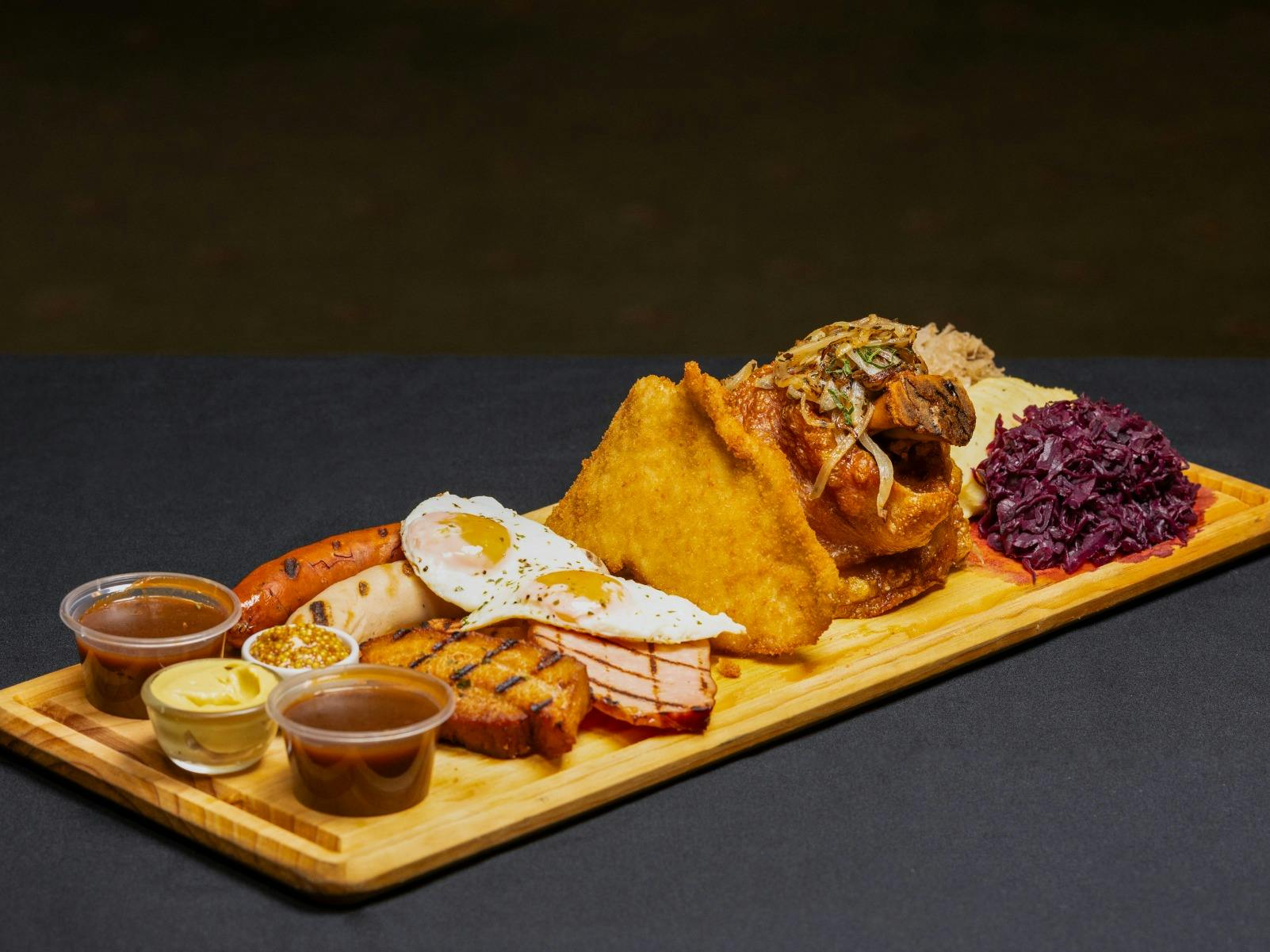 Leberkase, wursts, egg, schnitzel, pork knuckle, red cabbage, sauerkraut and mash