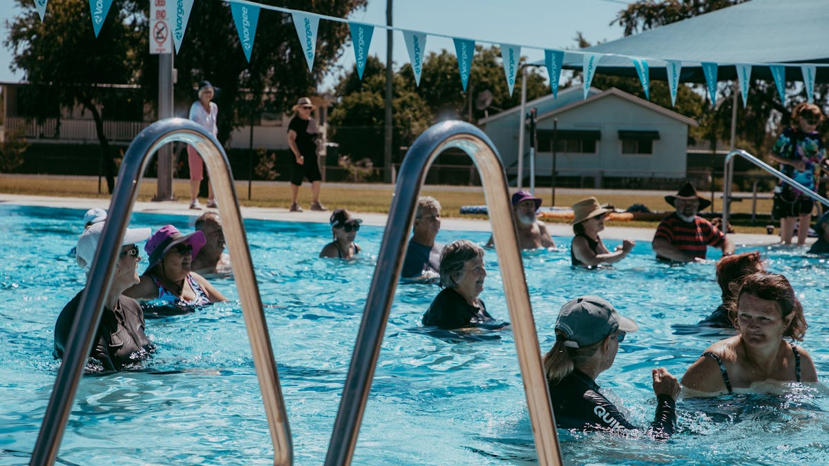 Community enjoying an aquatic lesson at the pool