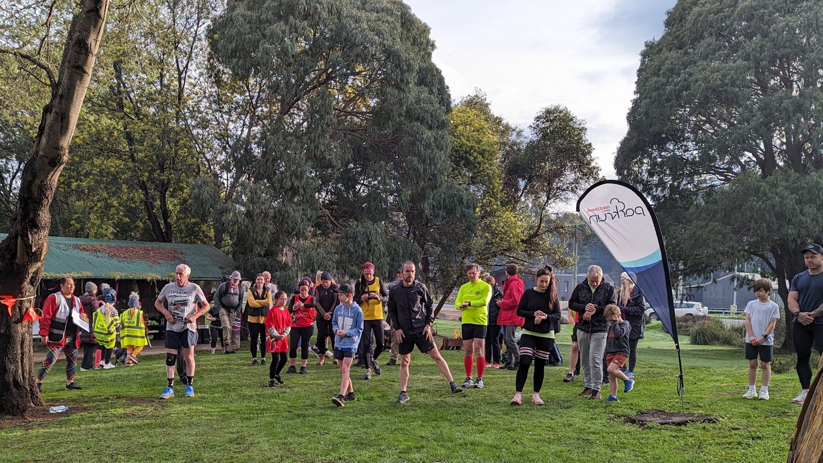 The starting bell rings at Geeveston parkrun's 5th birthday