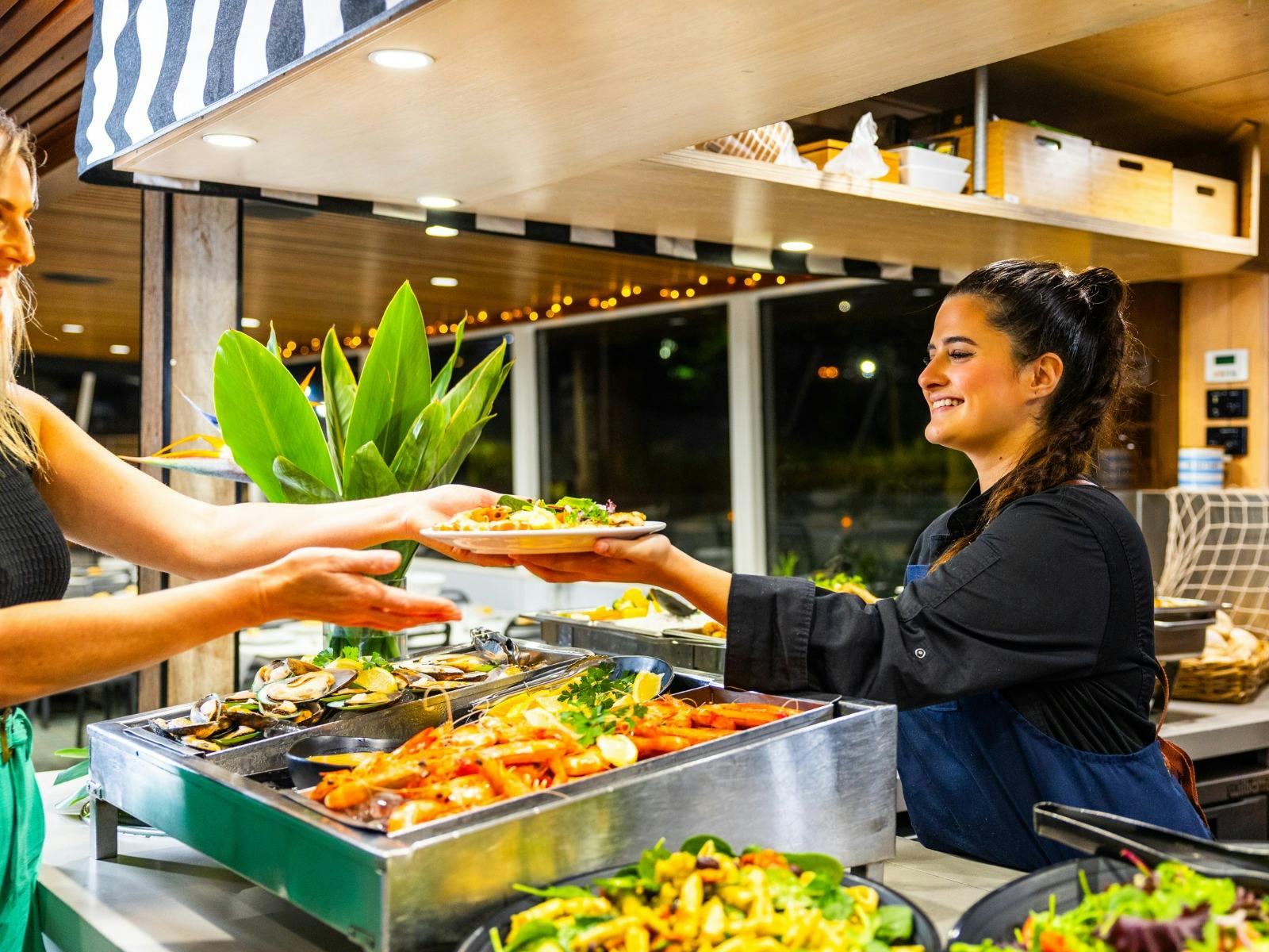 Sea World Cruises chef-prepared full-buffet dinner features fresh seafood, desserts and more.