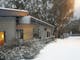 Diana Alpine Lodge on Falls Creek Road in early snow