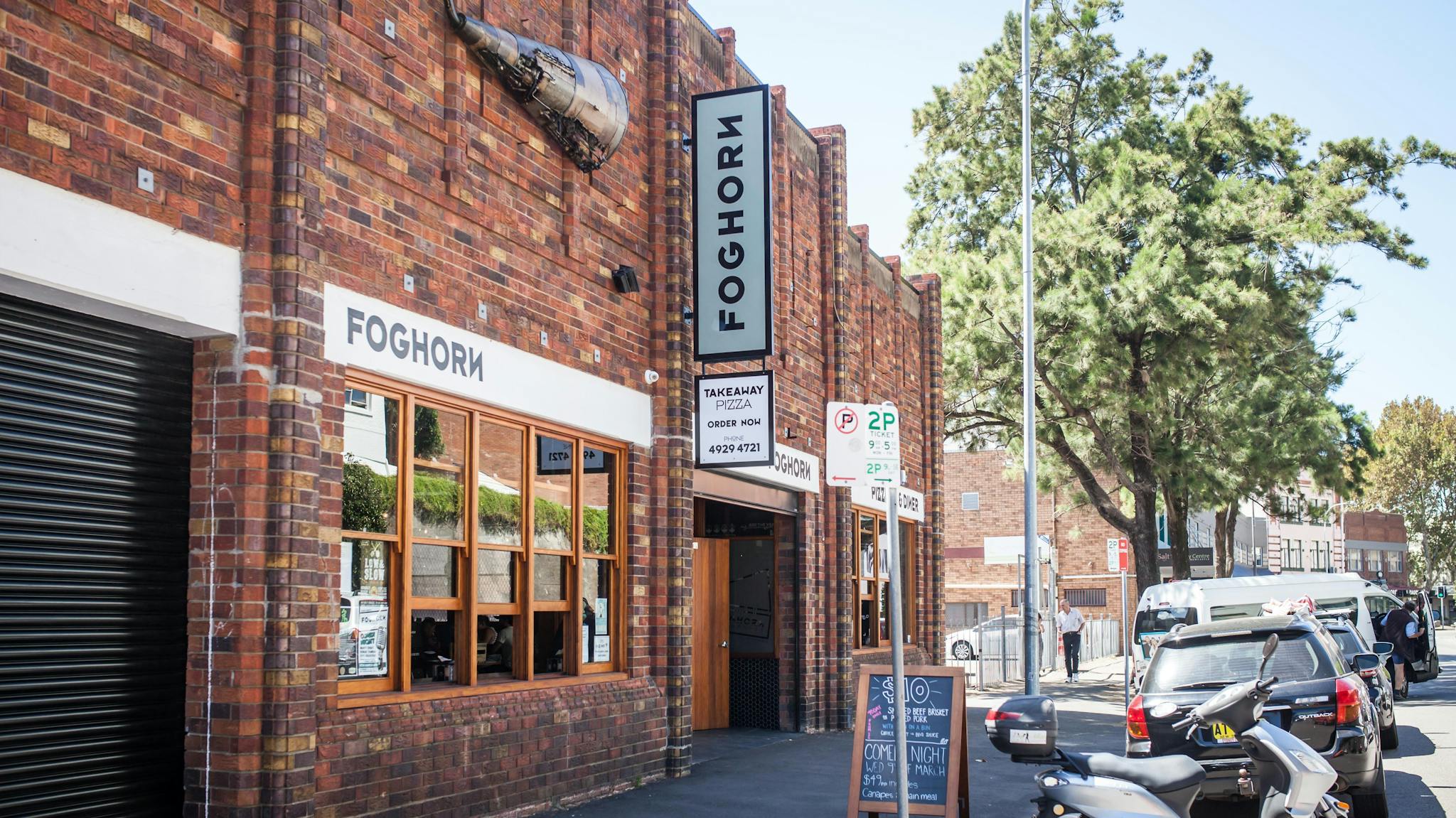 The front façade of FogHorn Brewhouse on a nice sunny day