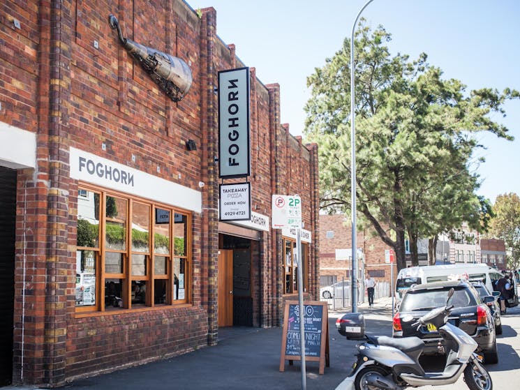 The front façade of FogHorn Brewhouse on a nice sunny day