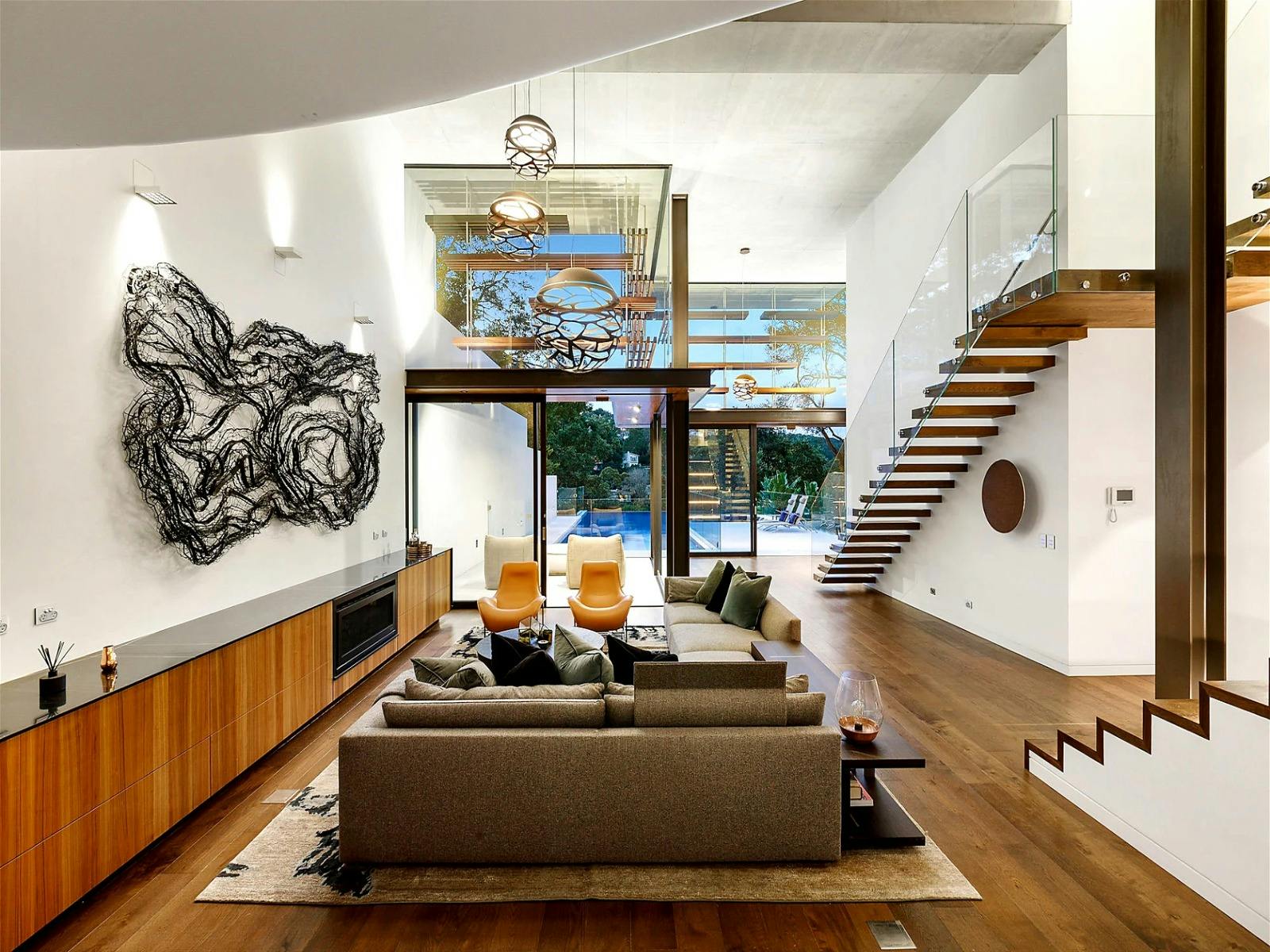 the lounge room with its dramatically 7 meter high ceilings