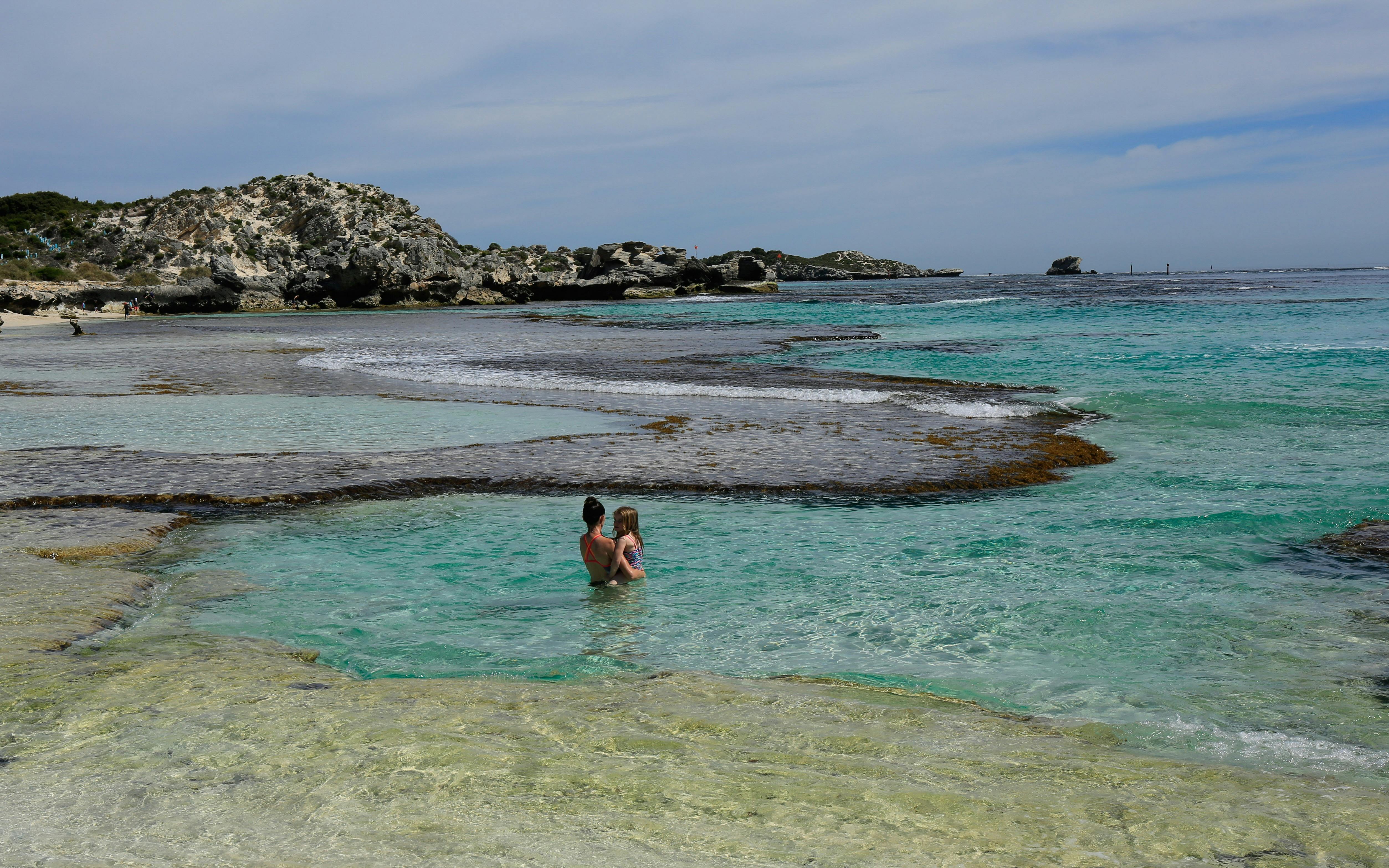 Mother and child in a rock pool at the Basin, Rottnest