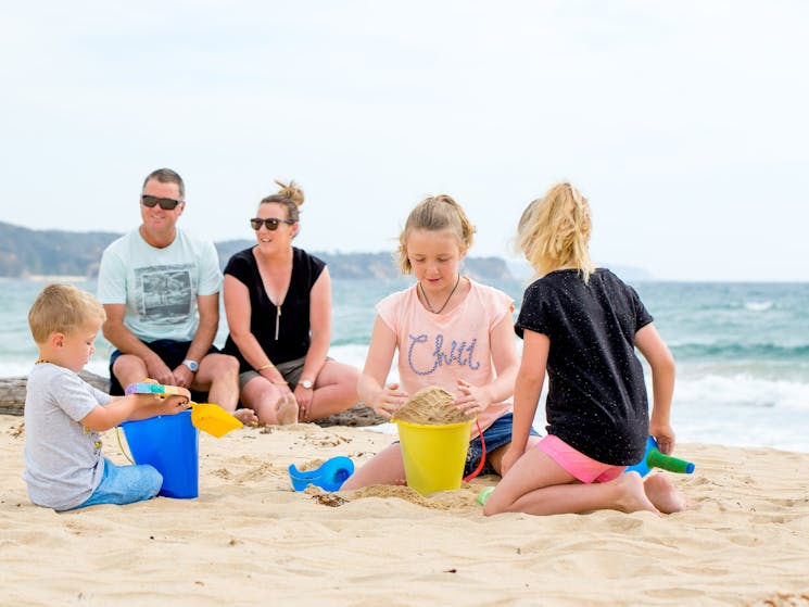 Family enjoying a day on beautiful Tathra Beach only 100meters from BIG4 Tathra Beach Holiday Park