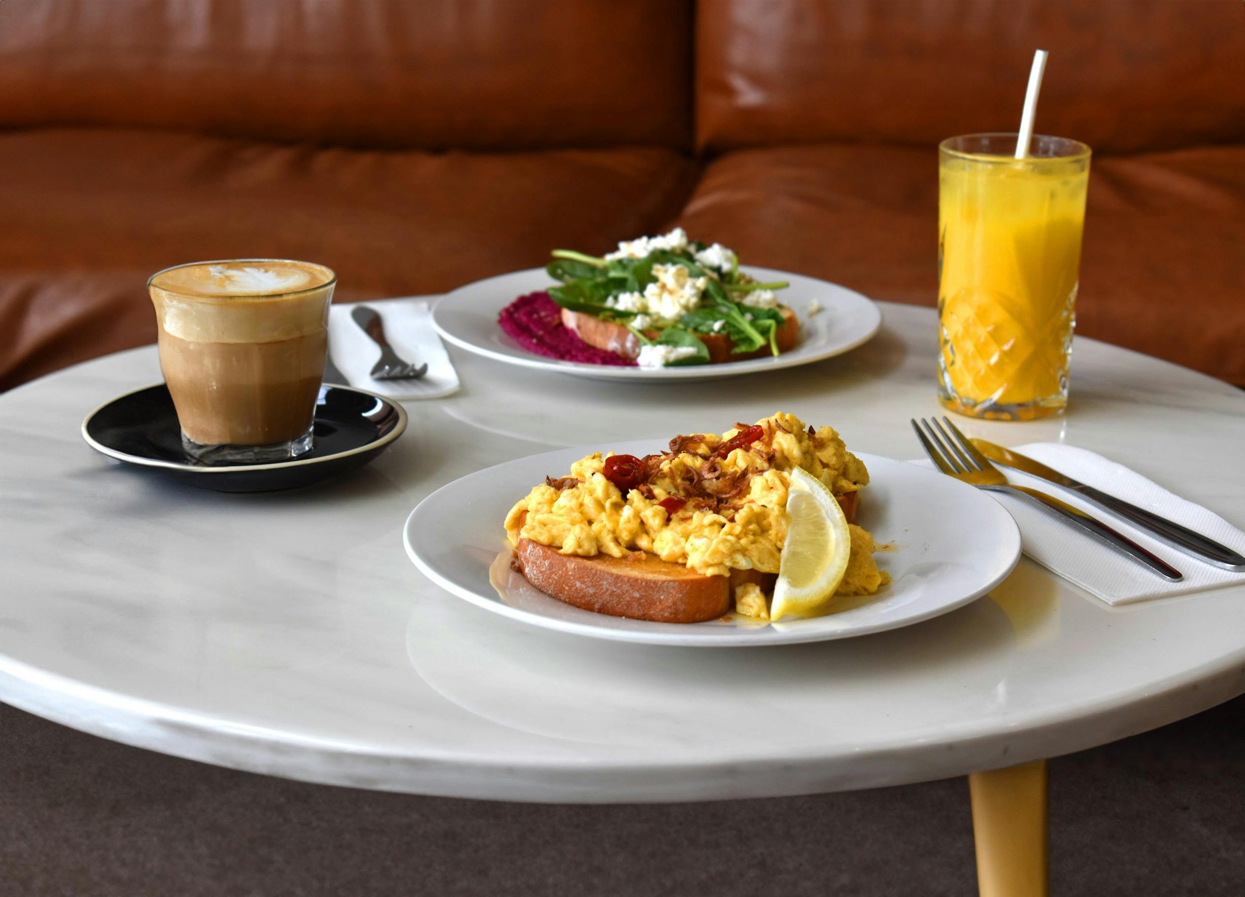 Thynk Breakfast on a lower height table by couches