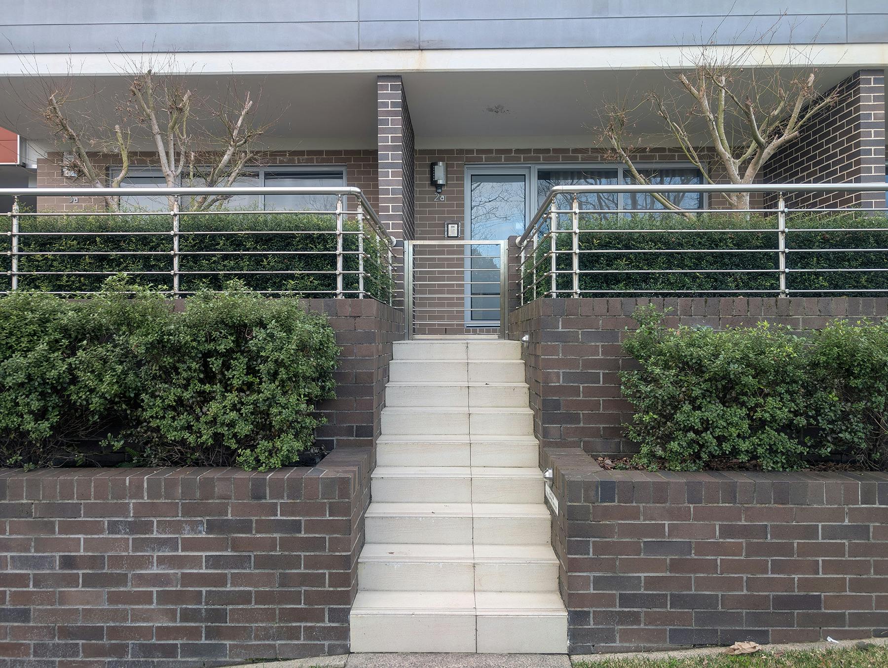 Stairs from the footpath up to the Studio Apartment