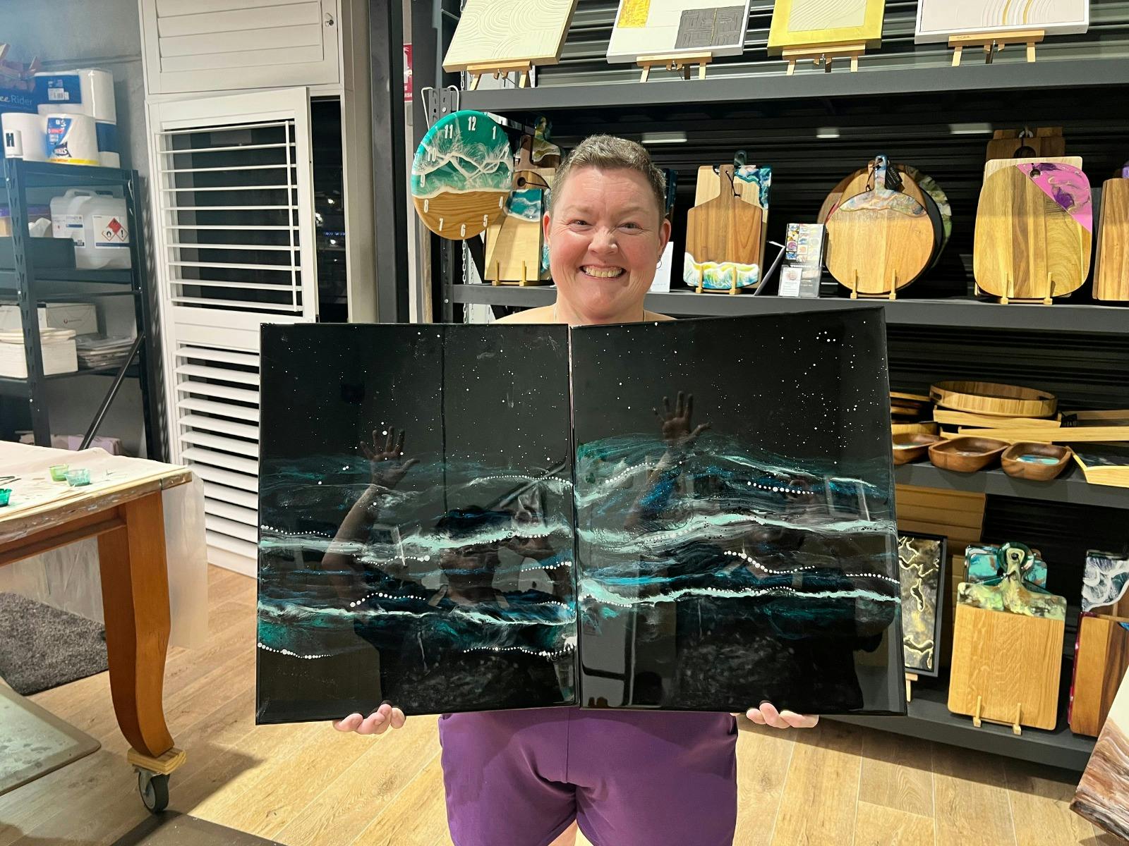 happy camper with completed artwork