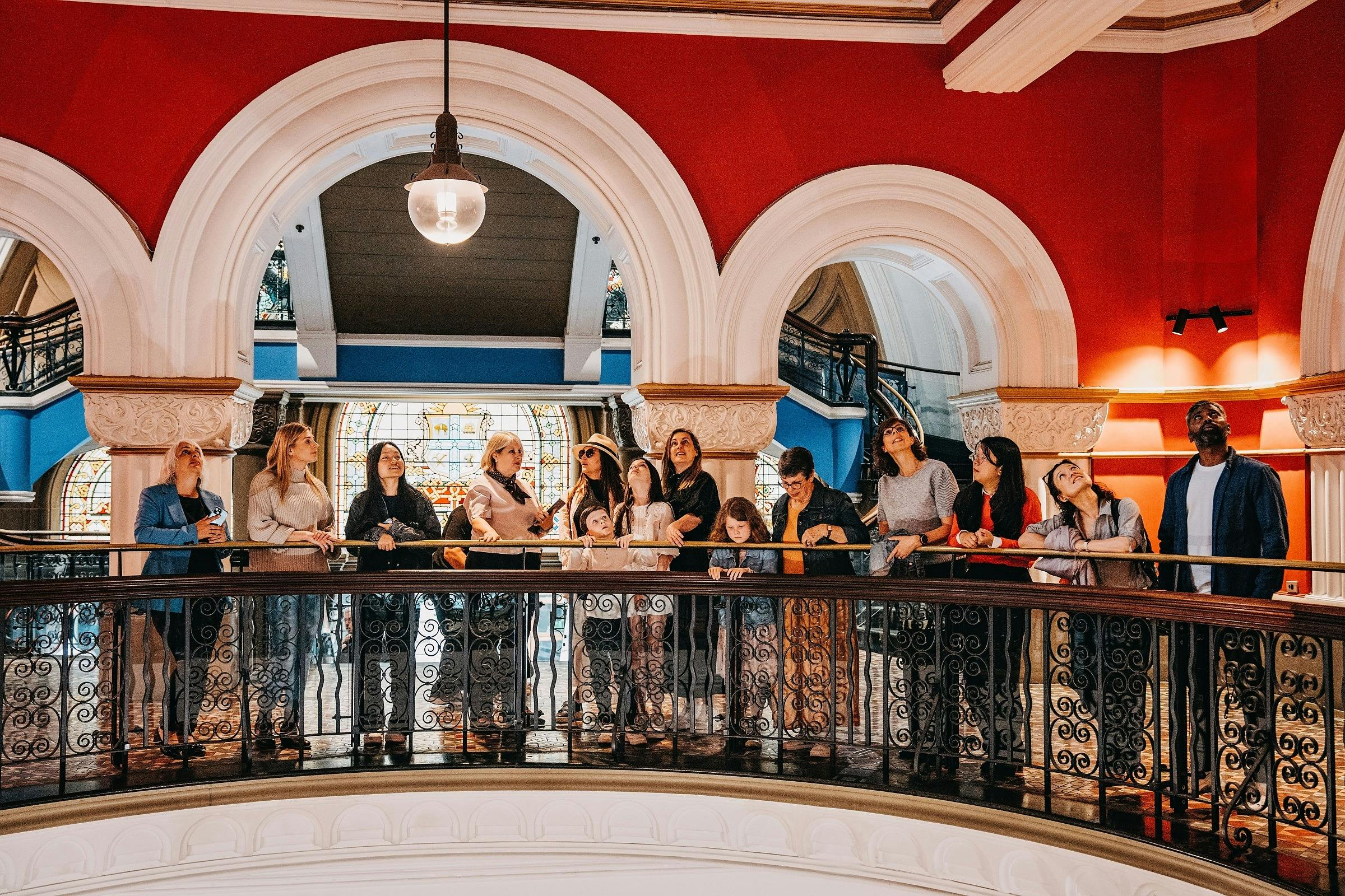 A group on the QVB History Tour looking at the centre dome