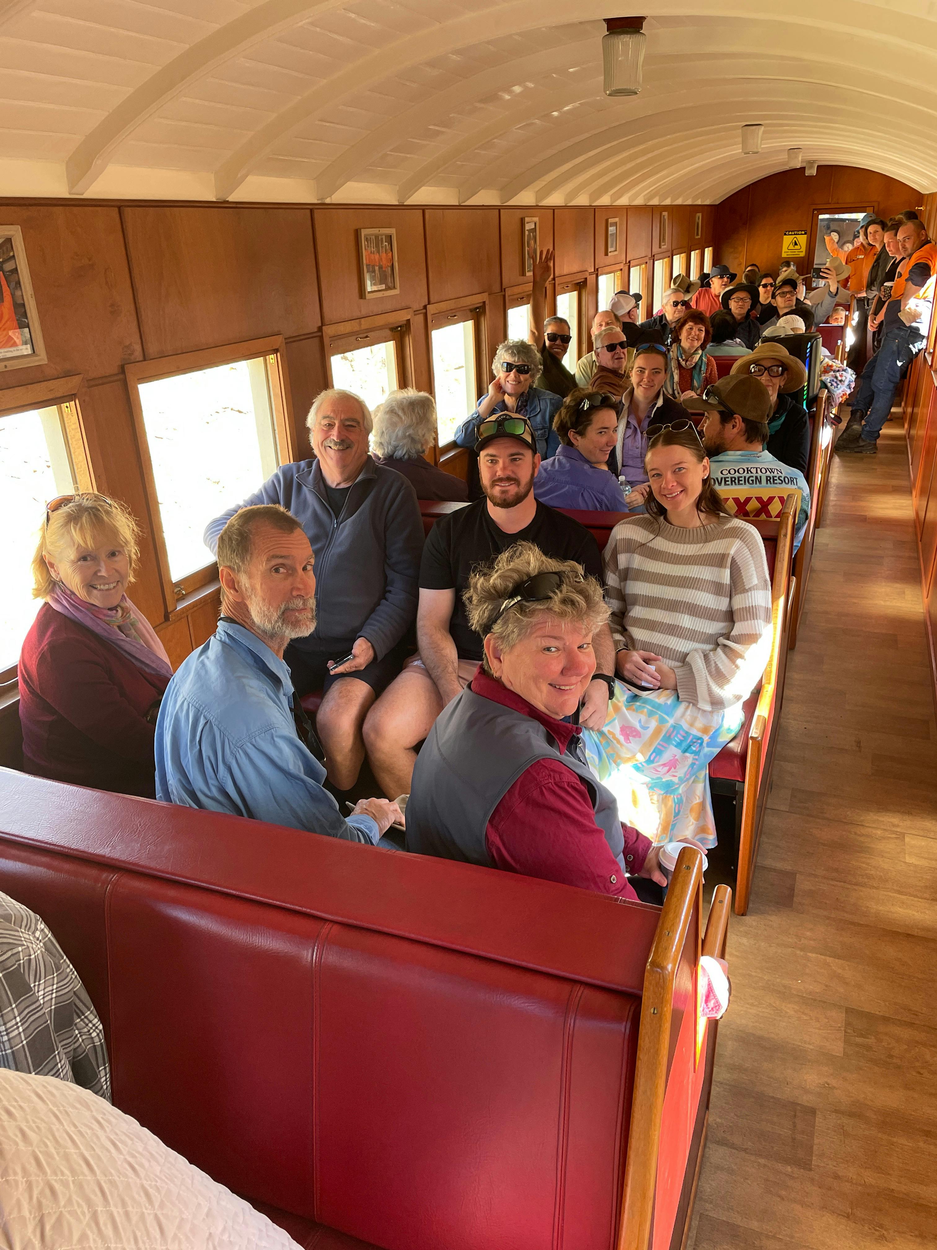 Passengers on 1913 timber carriage
