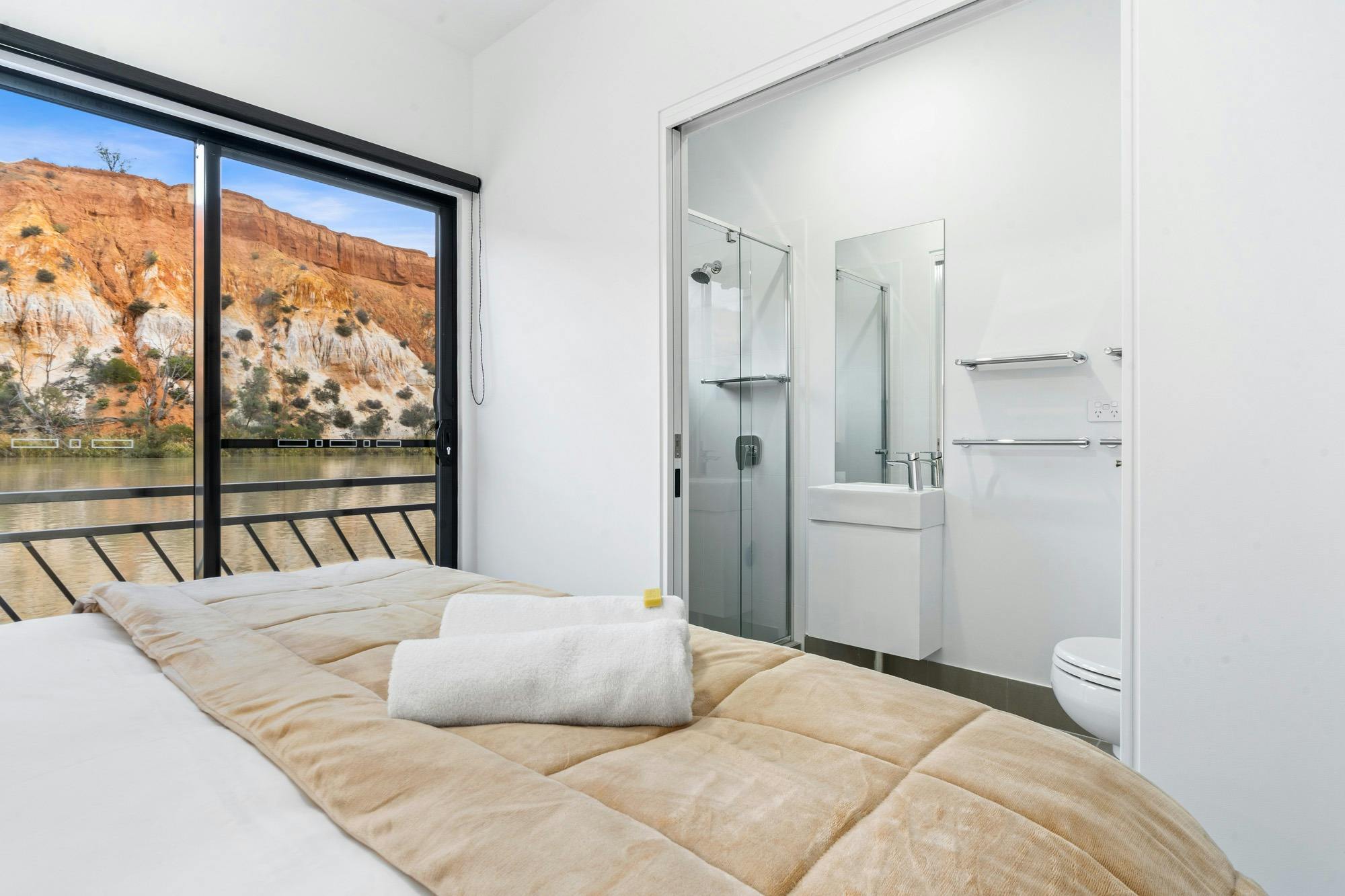 Houseboat bedrooms have scenic views and ensuite bathrooms