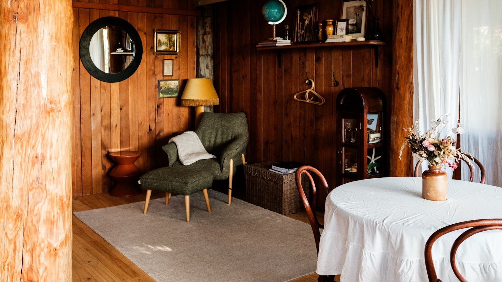 The studio features a book nook ad dining table.