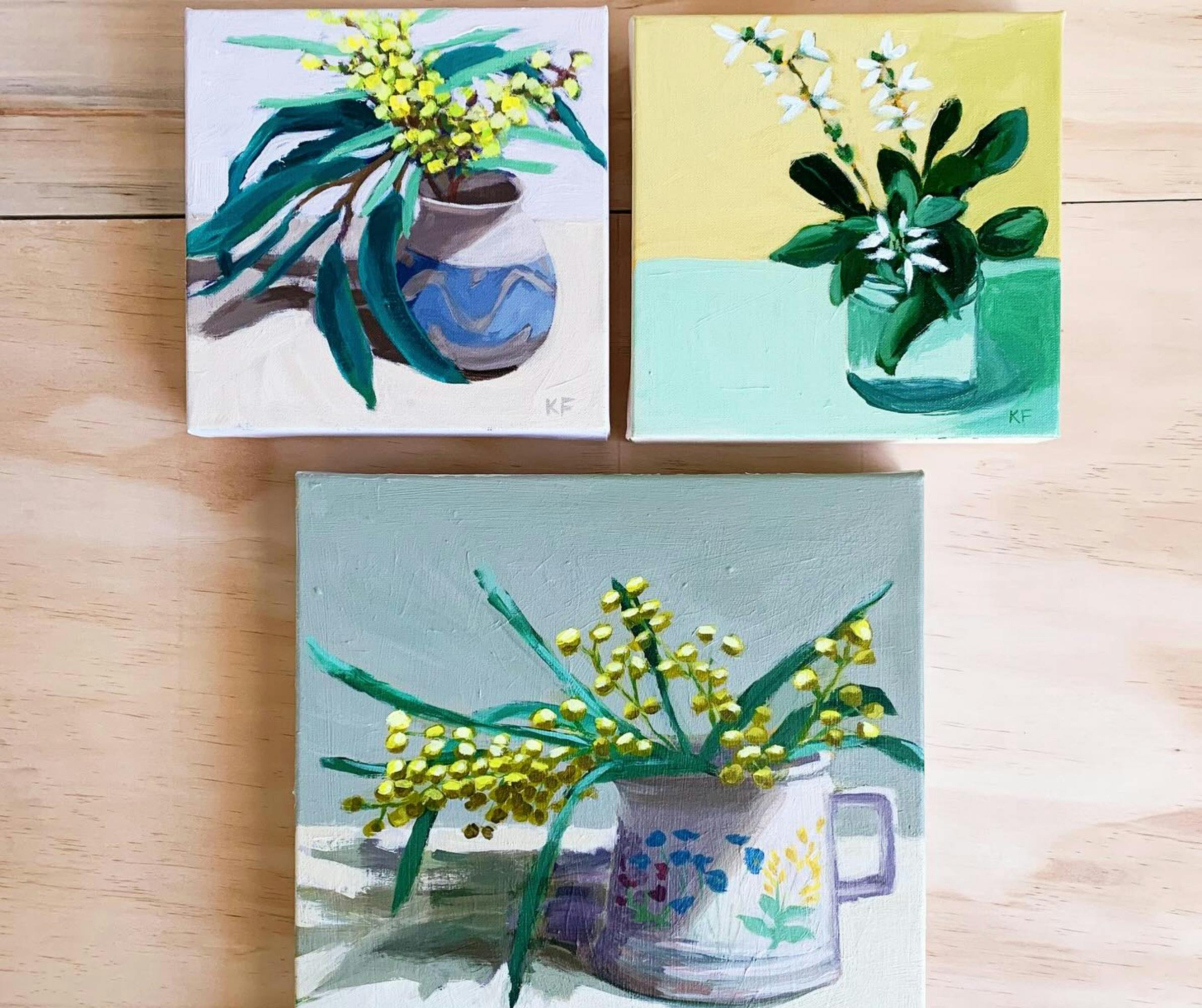 A sneak peak photo of three small canvas paintings of Kristen Finlay's work.